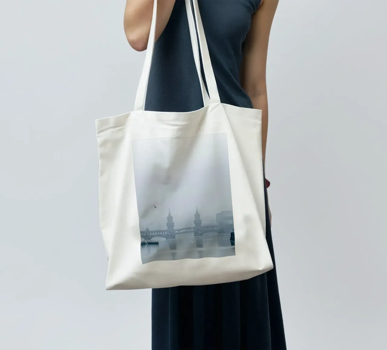 Oberbaum Bridge in the winter fog tote bag by Henk Henkel