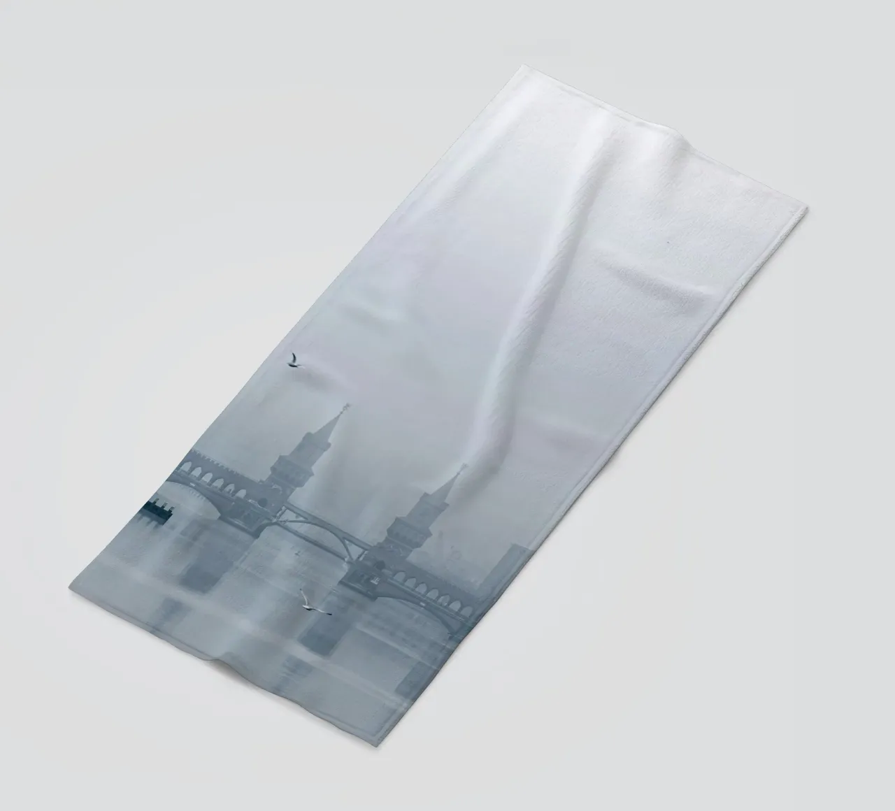 Oberbaum Bridge in the winter fog beach towel by Henk Henkel