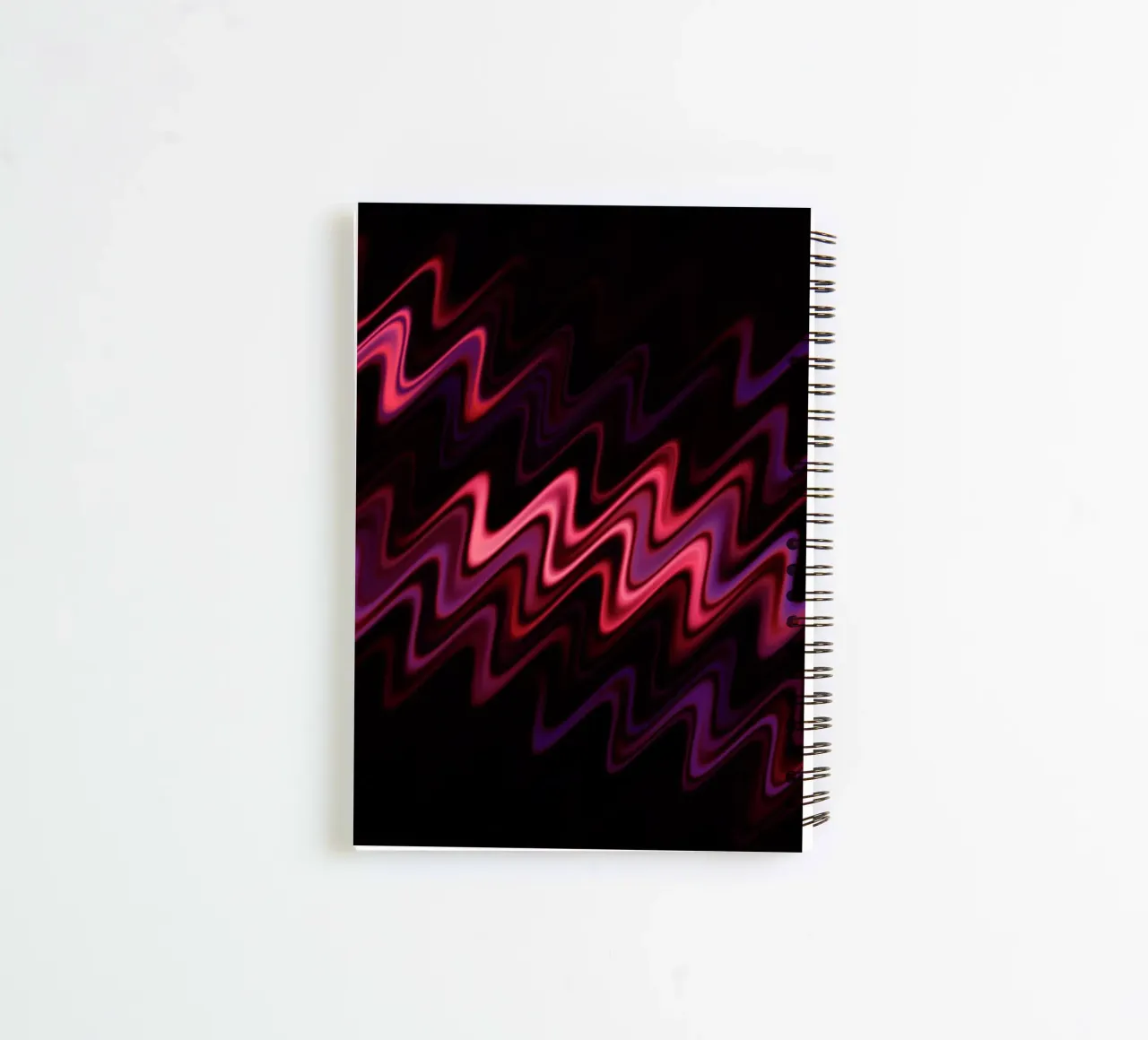 Abstract waves and a dynamic pattern in pink and purple spiral notebook by Something for you