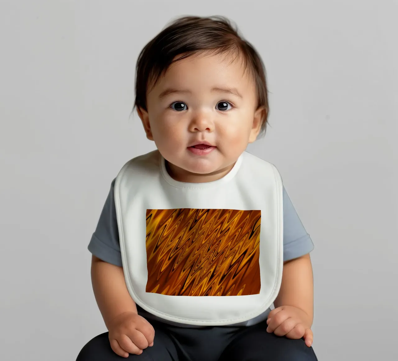 Abstract dynamic wave pattern in orange and red baby bib by Something for you