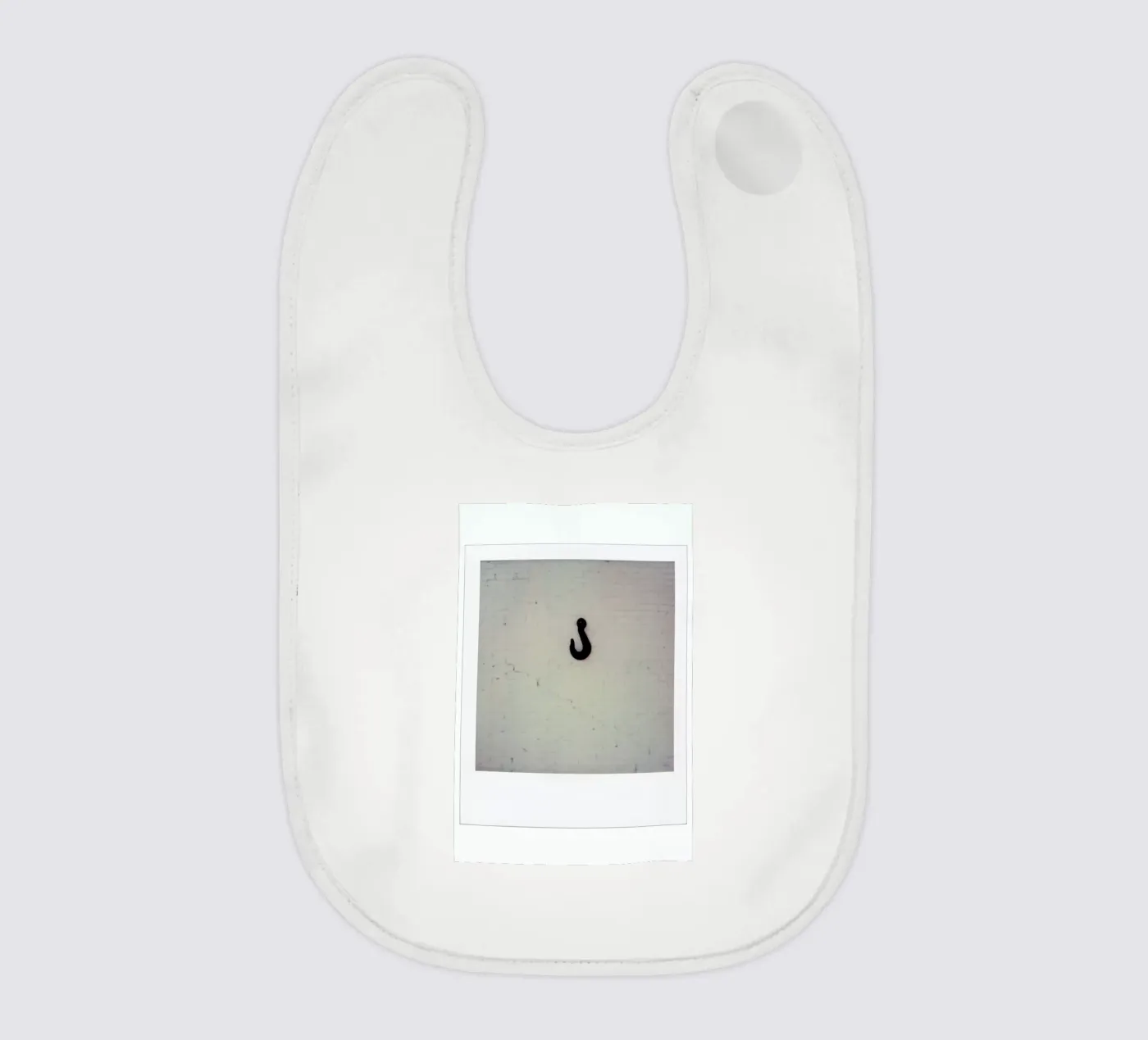 Hook baby bib by Lou Garoup