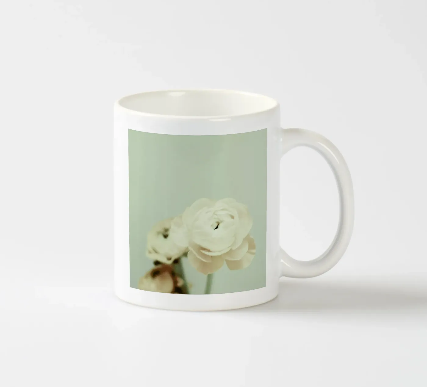 Cream ceramic mug by Morgan Kendall