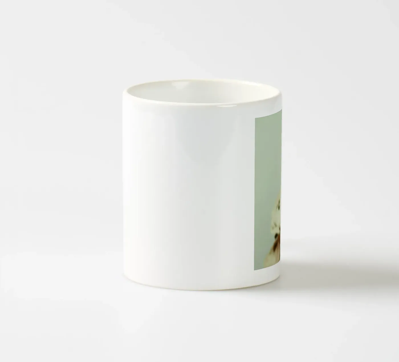 Cream ceramic mug by Morgan Kendall