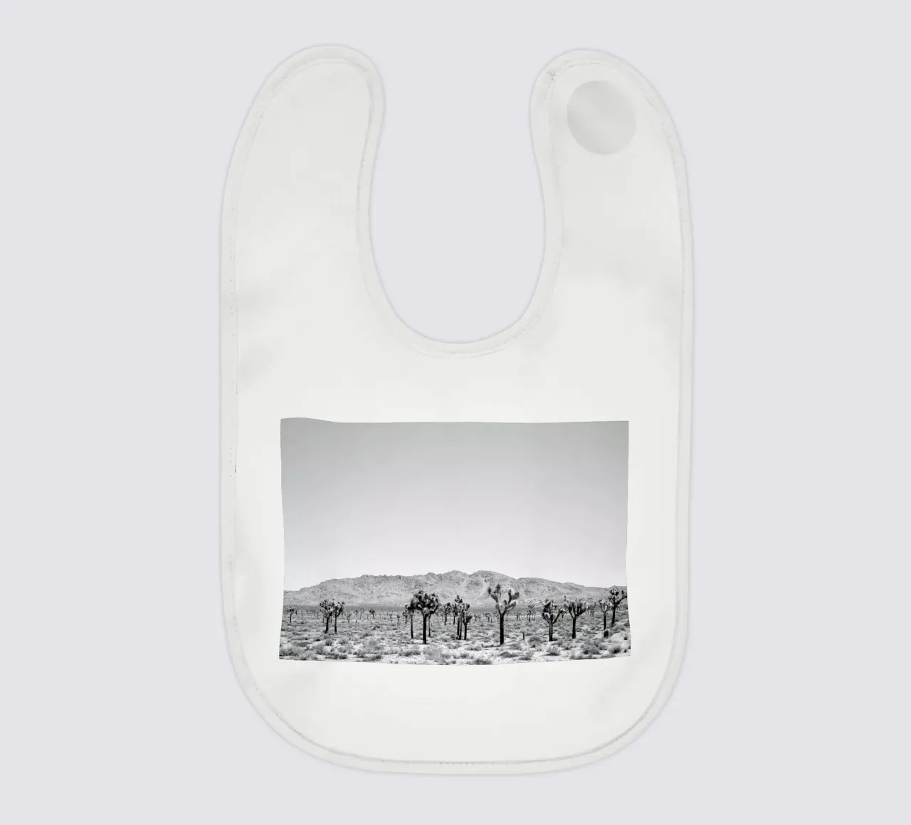 Sues Scape Babylätzchen von Shot By Clint