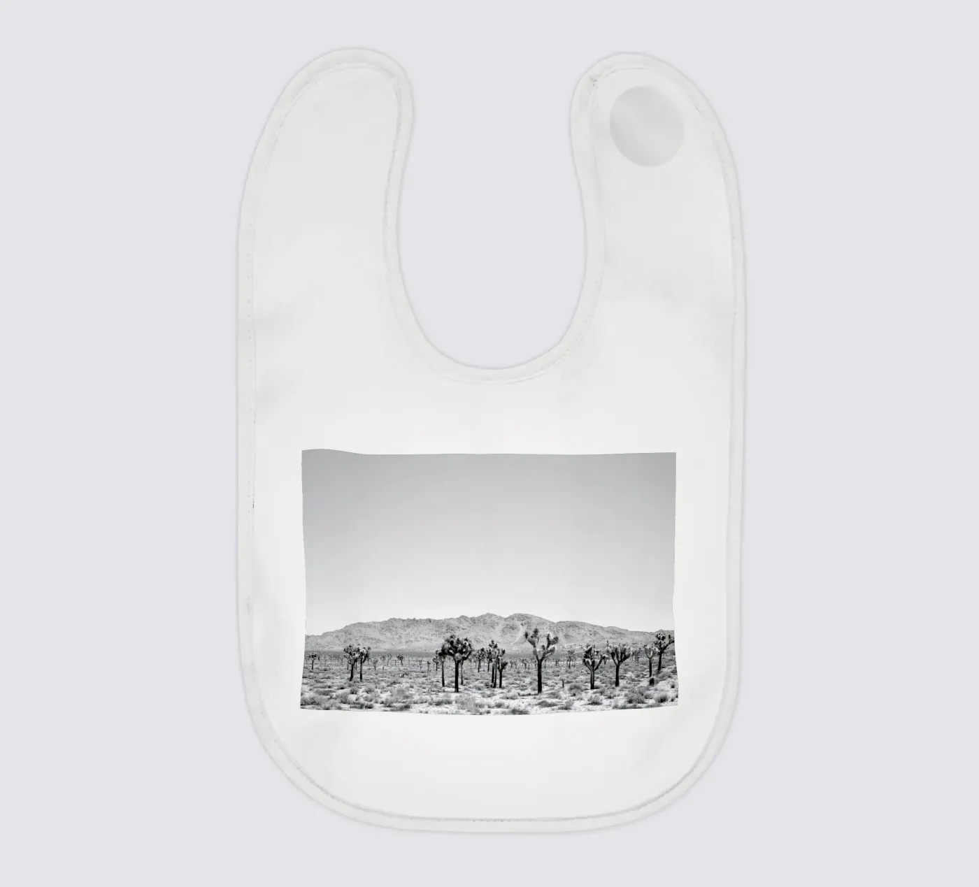 Sues Scape baby slabbetje van Shot By Clint