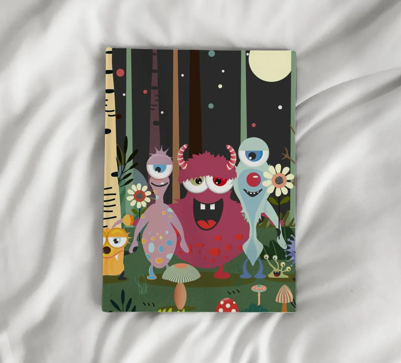 Un groupe de monstres joyeux dans une forêt enchantée carnet de notes de namosh