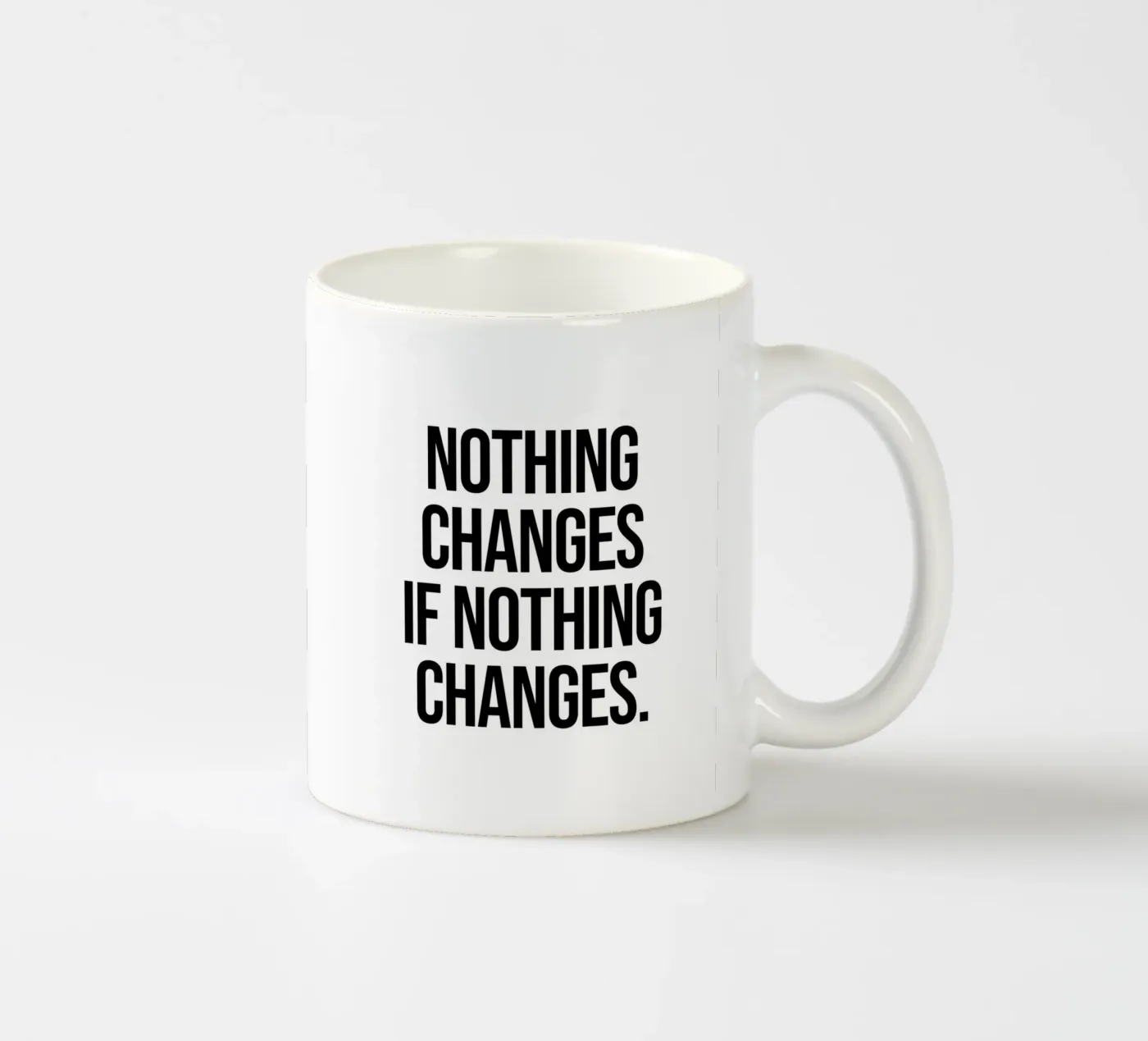 Nothing changes if nothing changes quote ceramic mug by Paigaam Studio