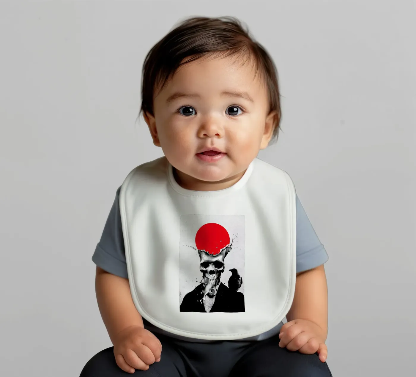 Splash Skull baby bib by Ali Gulec