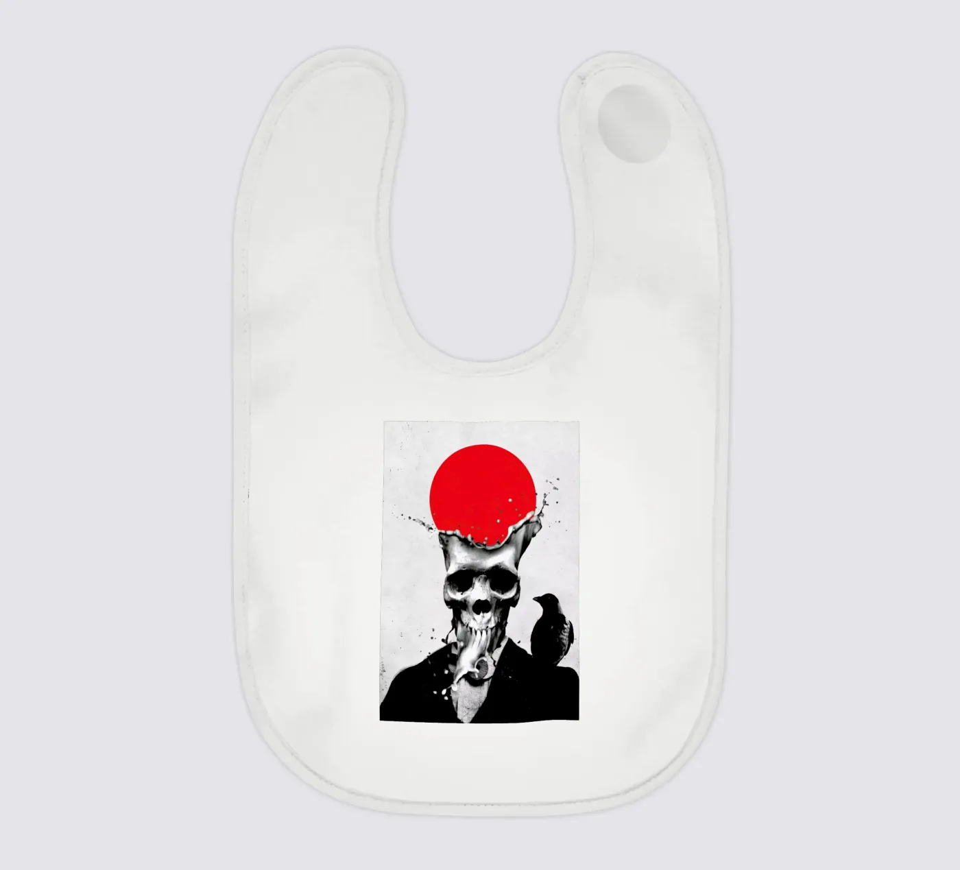 Splash Skull baby bib by Ali Gulec