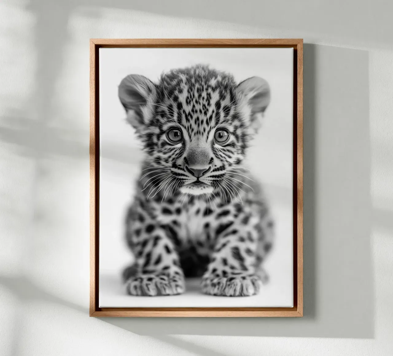 The wild softness of the leopard canvas with Floater frame by Monochrome
