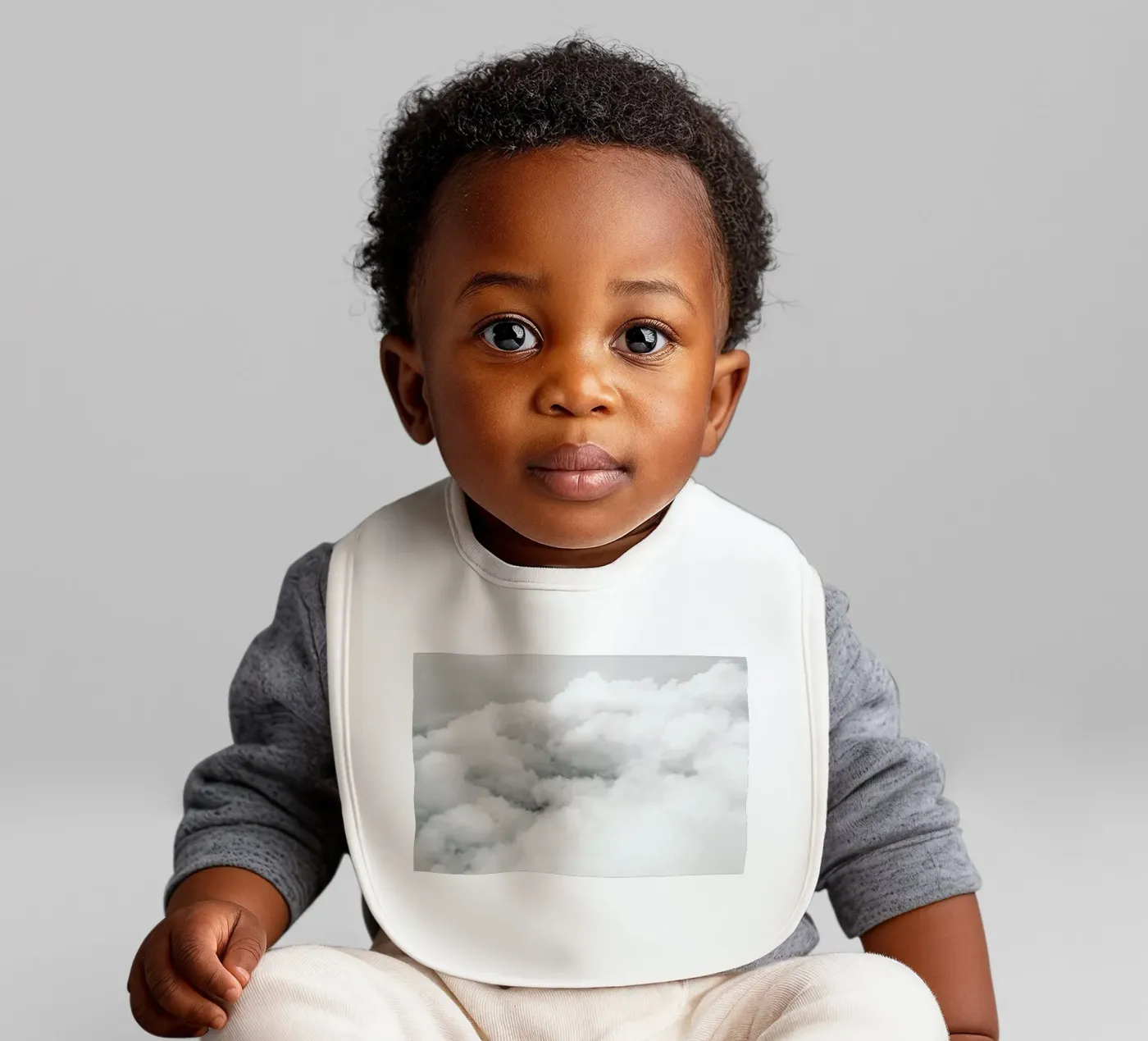Above the Clouds baby bib by Chris Abatzis
