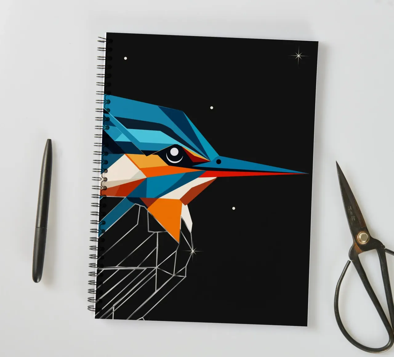 Geometric kingfisher - a blaze of colour in the night sky spiral notebook by namosh