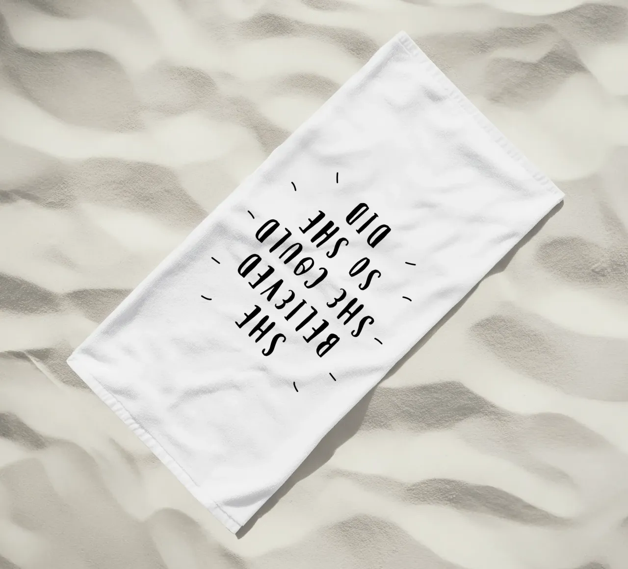 She Believed She Could So She Did Typografie Design in Black beach towel by THE MOTIVATED TYPE