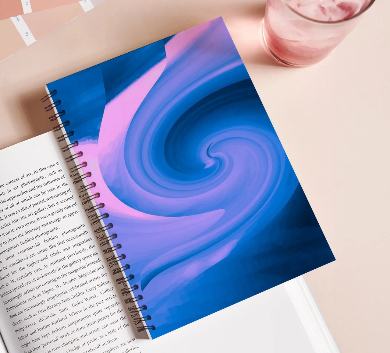 Abstract circular twisted pattern in blue and pink spiral notebook by Something for you