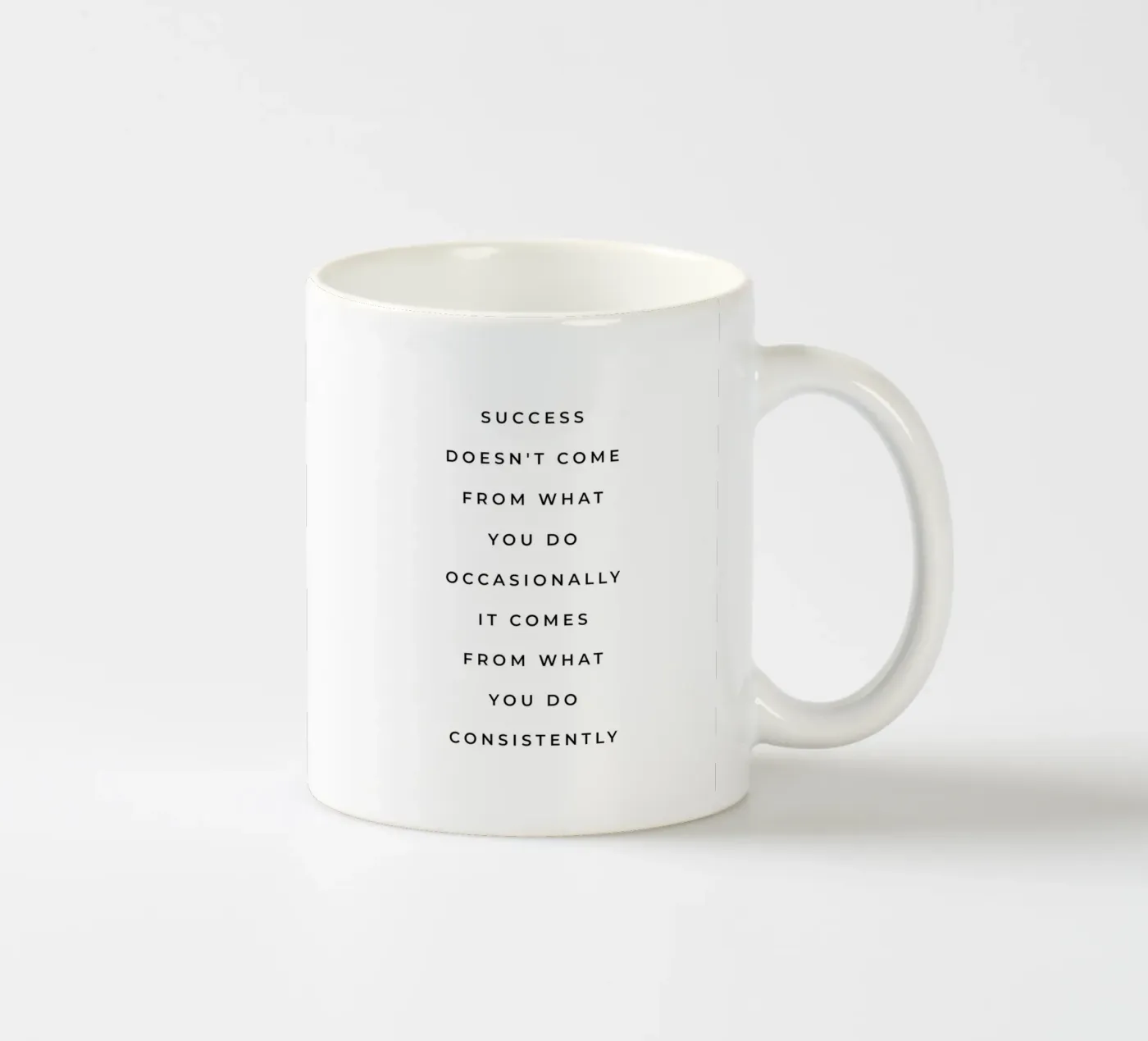 Consistency quote ceramic mug by Paigaam Studio