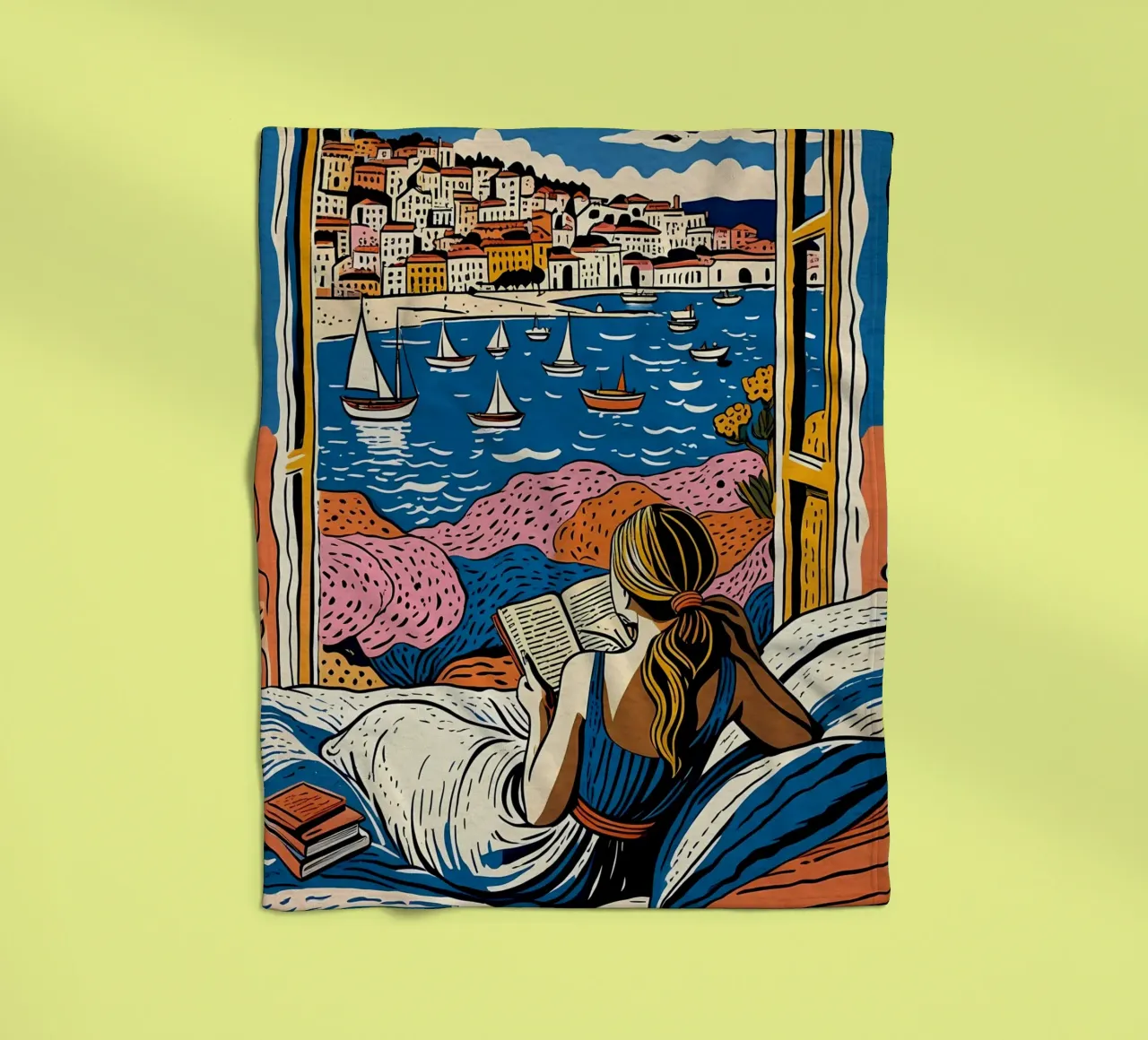 Reader in front of the window in Cannes fleece blanket by Couleursdusud
