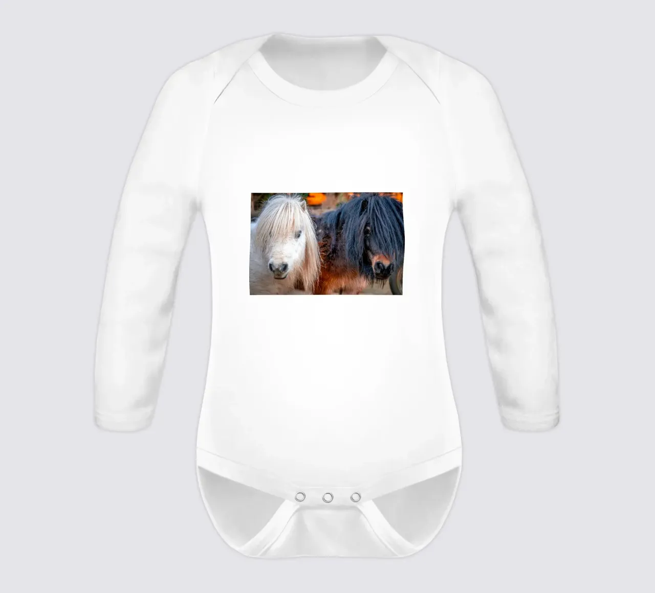 White and black fringes long-sleeve baby romper by Marcus Beckert | Fotografie