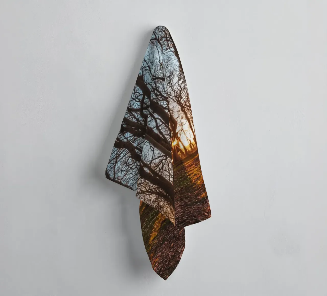 Sun star in the ghostly forest on the Baltic Sea towel by Marcus Beckert | Fotografie