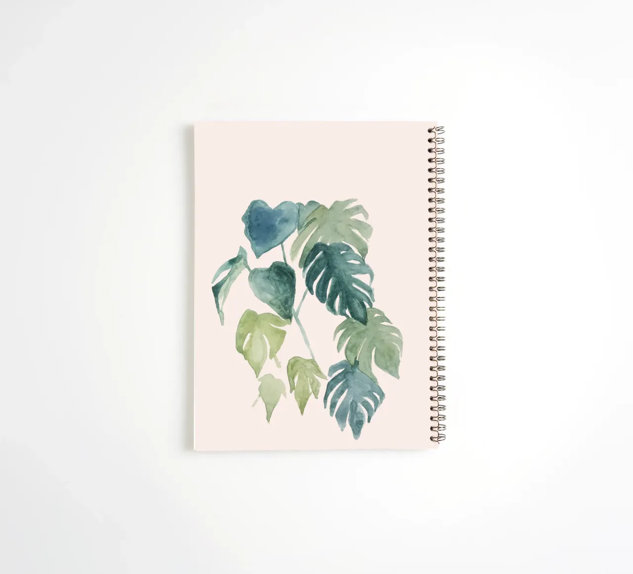 Hand-painted watercolour palm and monstera jungle leaves spiral notebook by Bloomery Decor