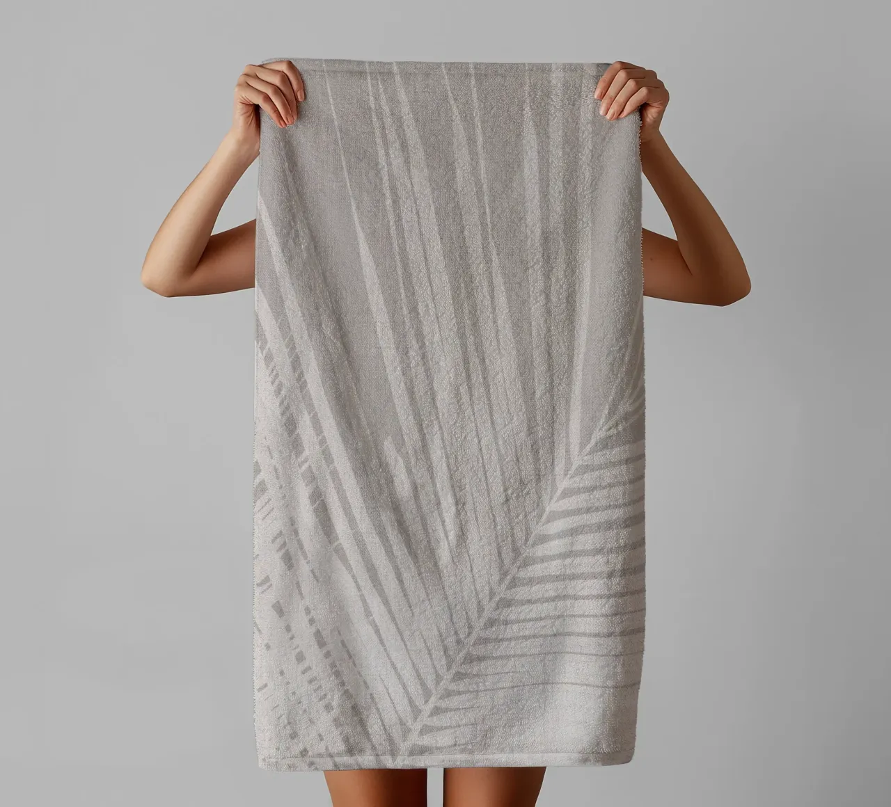 Neutral palm leaf on beige linen texture towel by Bloomery Decor