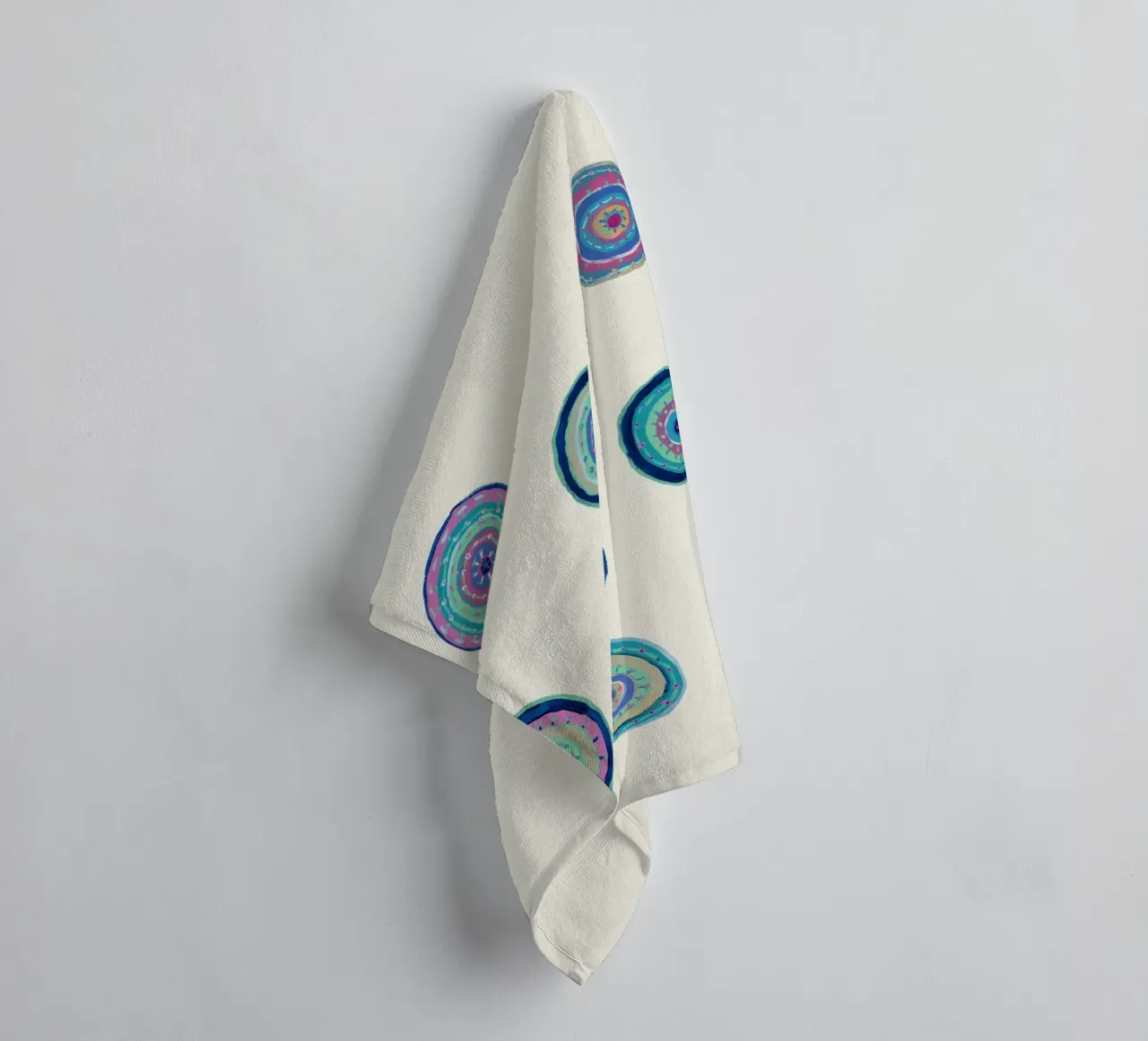 Dancing Orbs-Cream towel by Helen Joynson