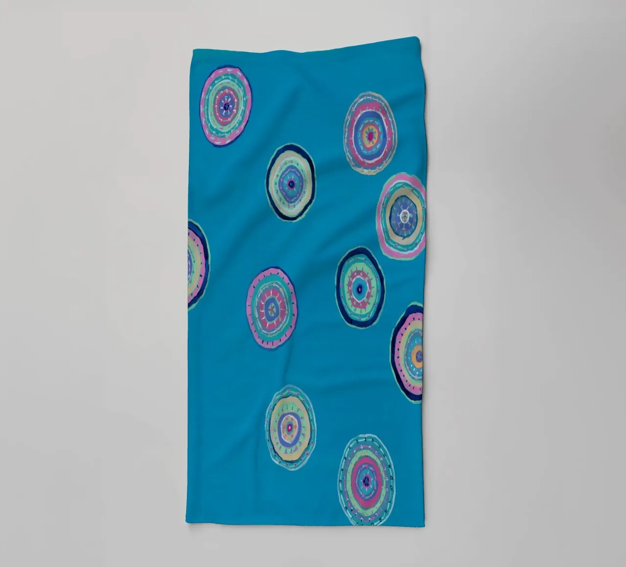 Dancing Orbs towel by Helen Joynson