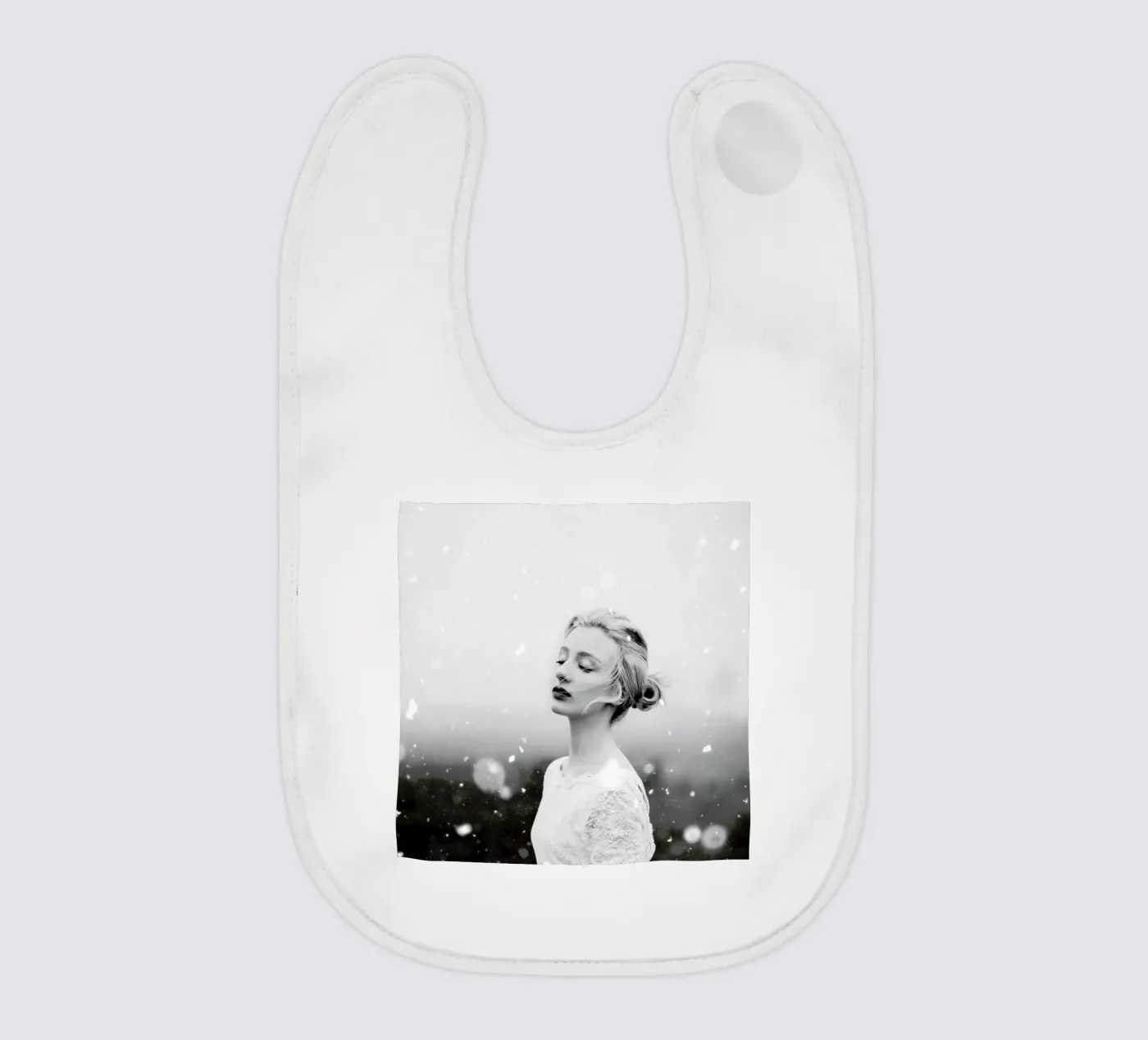 Snowing baby bib by Jovana Rikalo