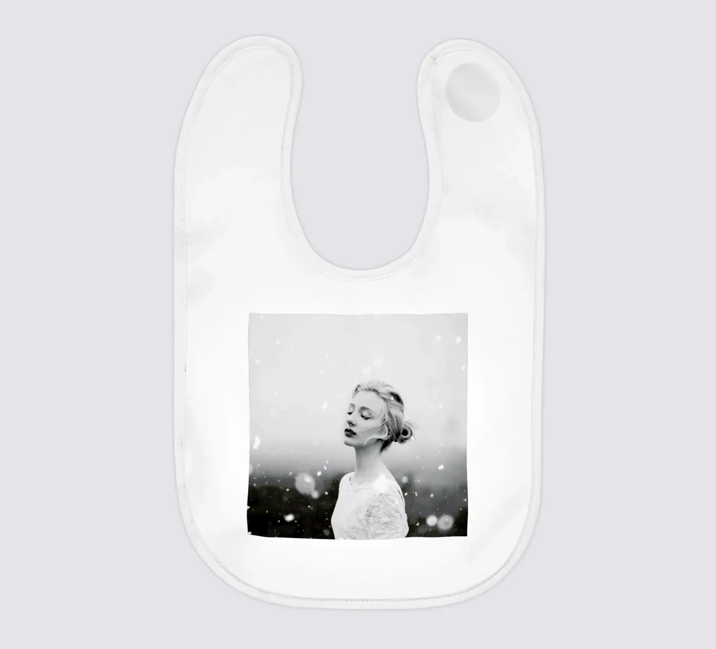 Snowing baby bib by Jovana Rikalo