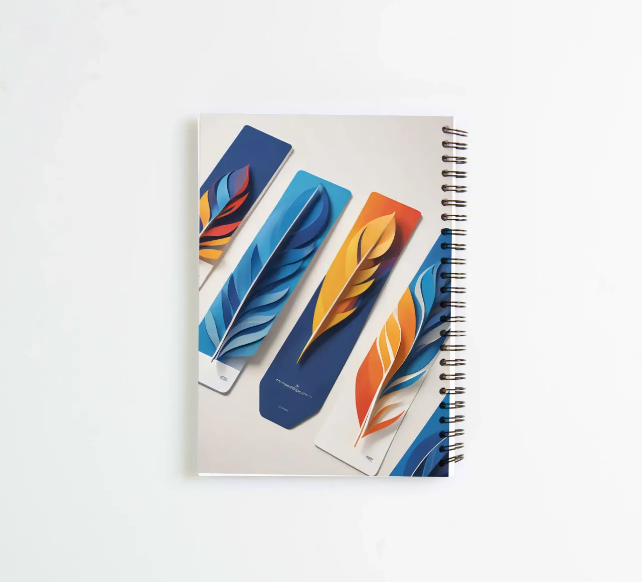 paper art design featuring colorful layered feathers spiral notebook by DesignDoodle
