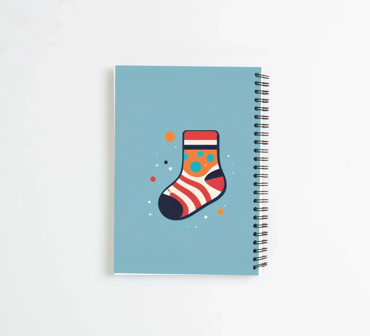 colorful sock with playful patterns spiral notebook by DesignDoodle