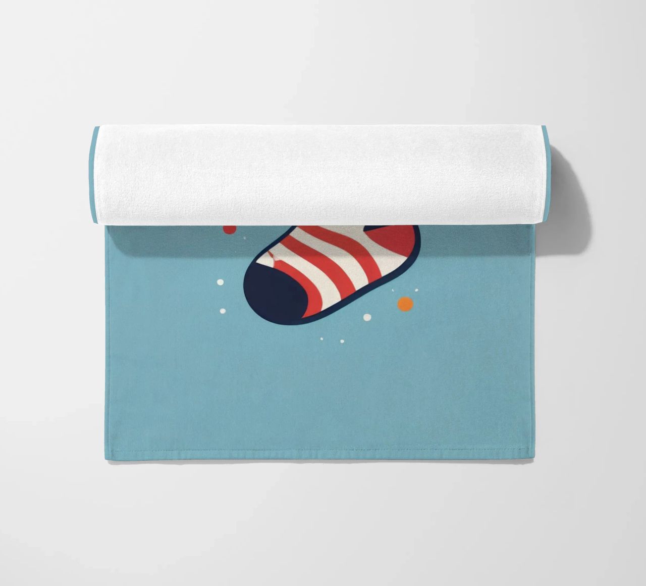 colorful sock with playful patterns on beach towel by DesignDoodle