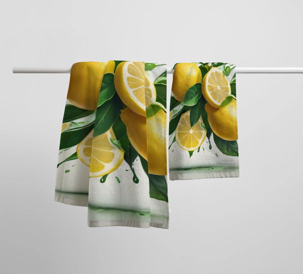 Bright lemon halves erupting with juice and splashes towel by DesignDoodle