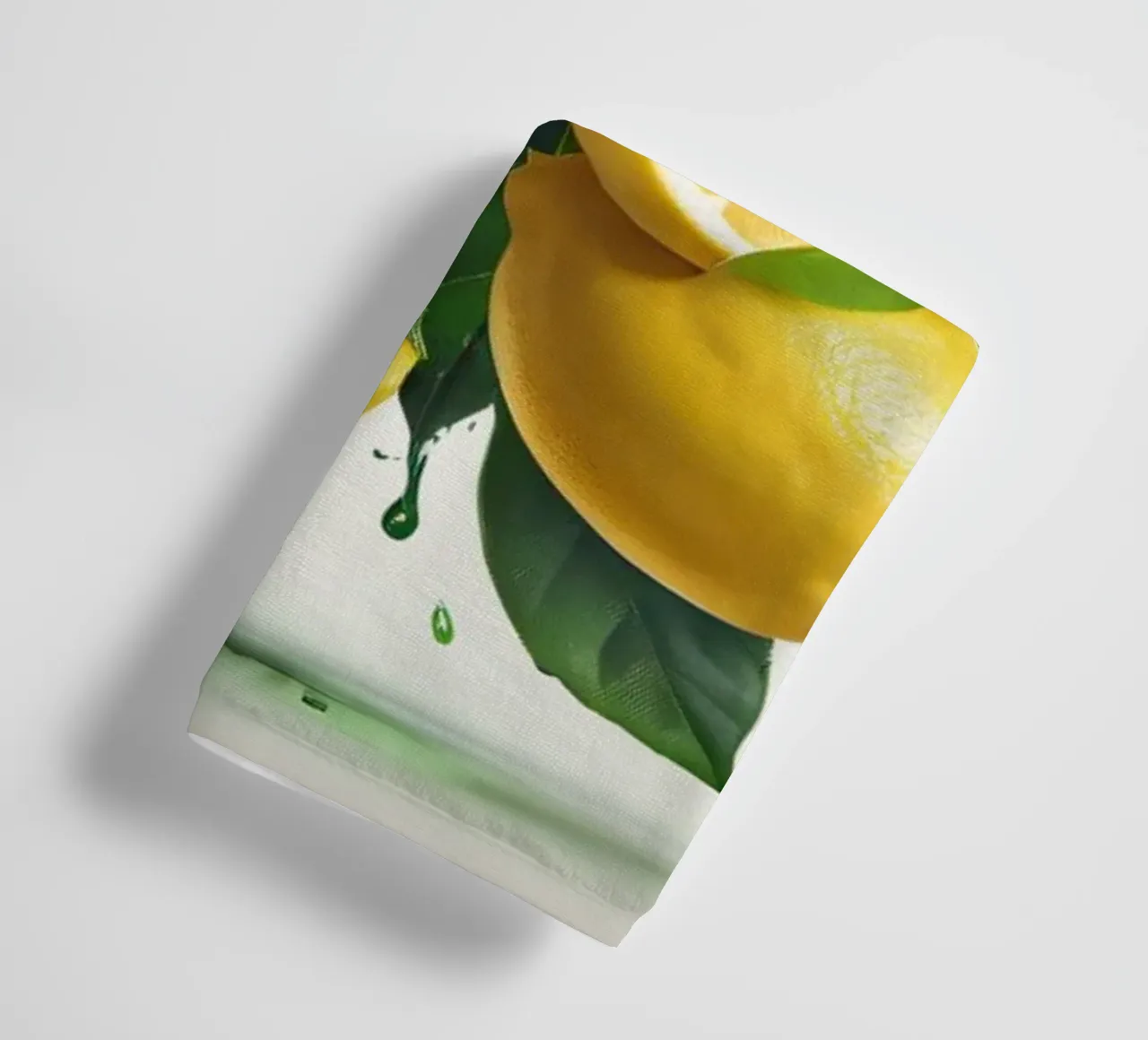 Bright lemon halves erupting with juice and splashes towel by DesignDoodle
