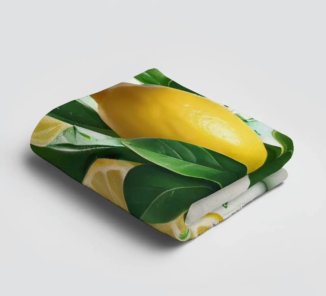Bright lemon halves erupting with juice and splashes towel by DesignDoodle