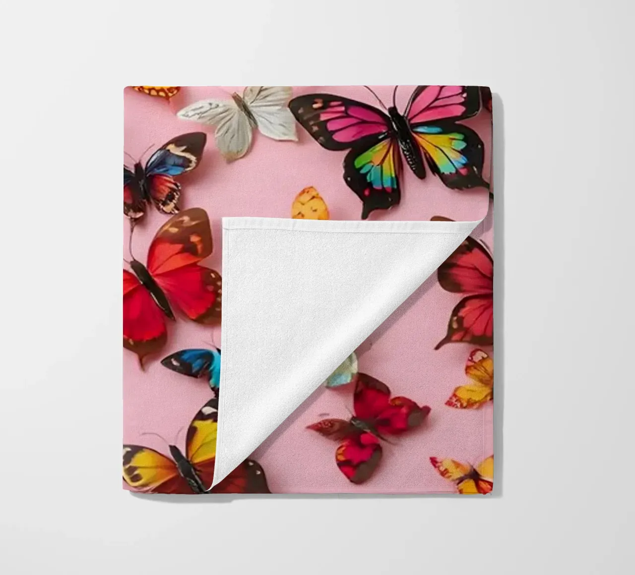 pink background with beautiful butterflies beach towel by DesignDoodle