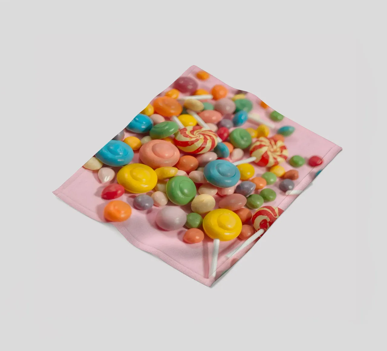 Assortimento di caramelle colorate sparse coperta in pile da DesignDoodle