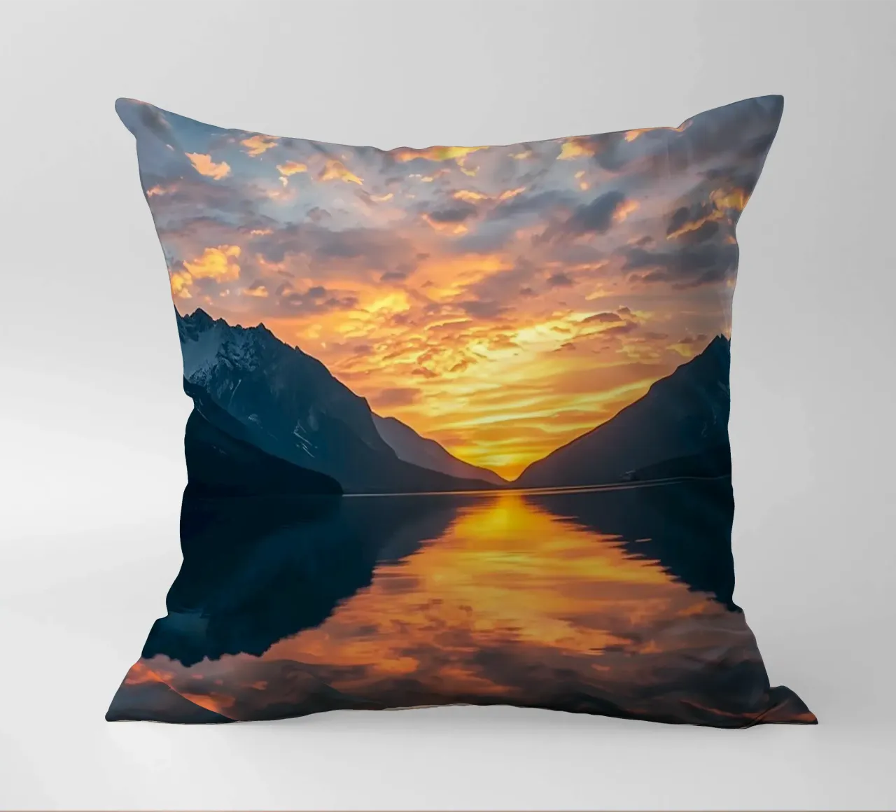 Sunset reflects on calm lake with mountains decorative cushion by DesignDoodle