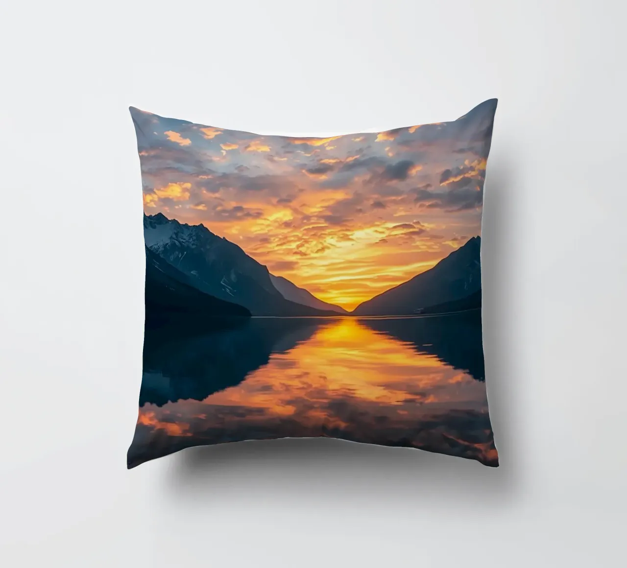 Sunset reflects on calm lake with mountains decorative cushion by DesignDoodle
