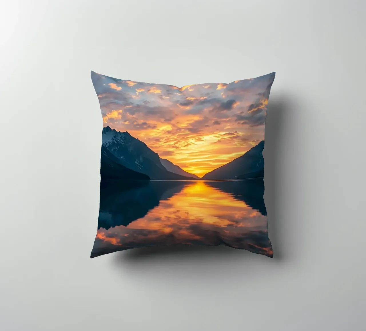Sunset reflects on calm lake with mountains decorative cushion by DesignDoodle