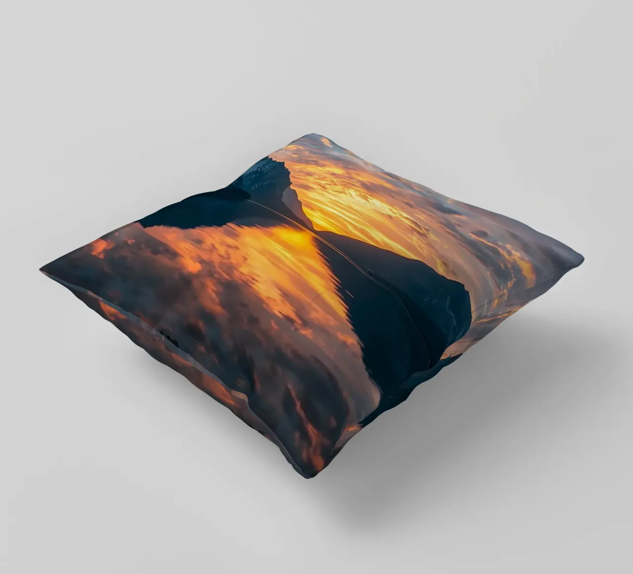 Sunset reflects on calm lake with mountains decorative cushion by DesignDoodle