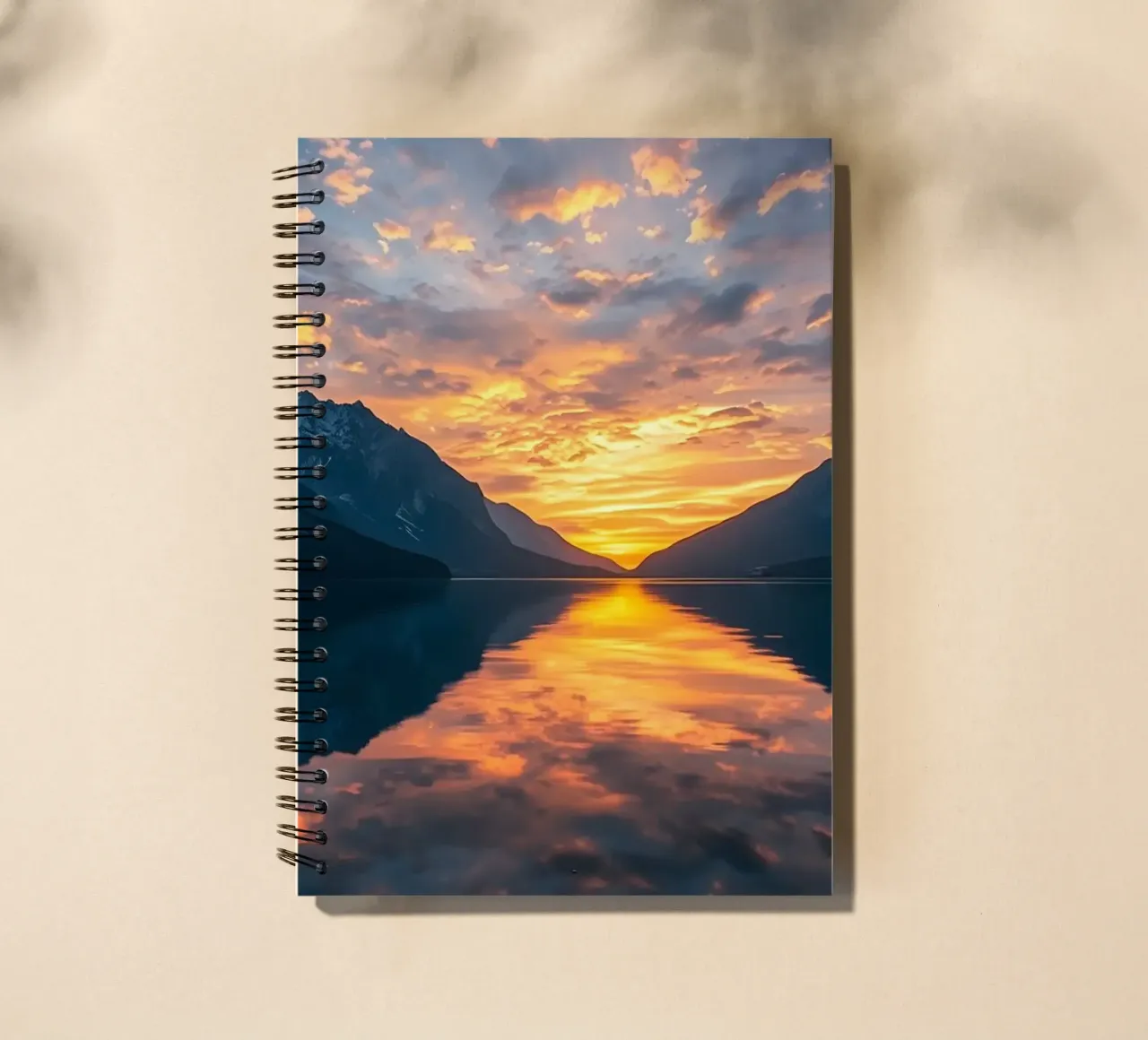 Sunset reflects on calm lake with mountains spiral notebook by DesignDoodle