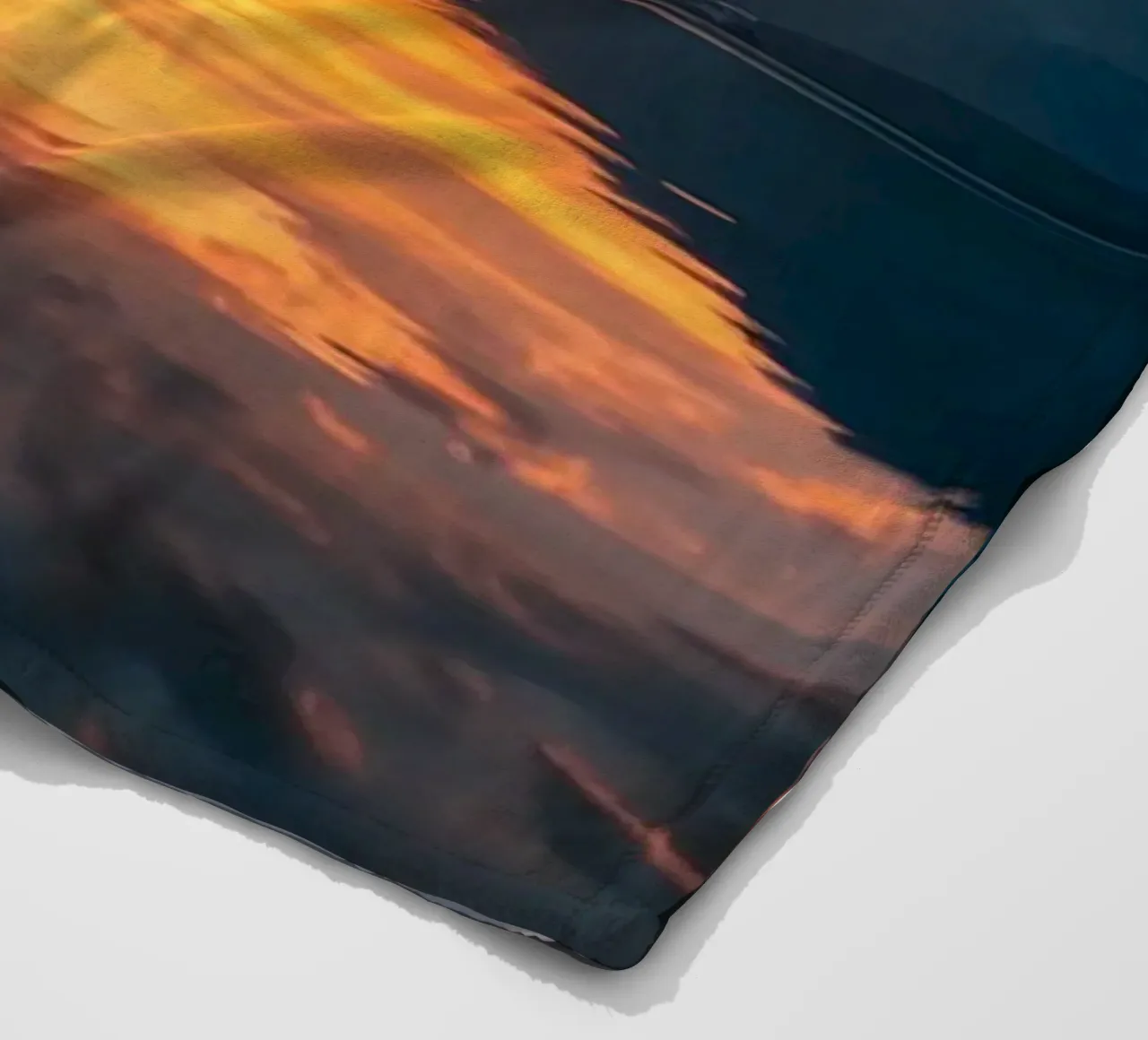 Sunset reflects on calm lake with mountains fleece blanket by DesignDoodle