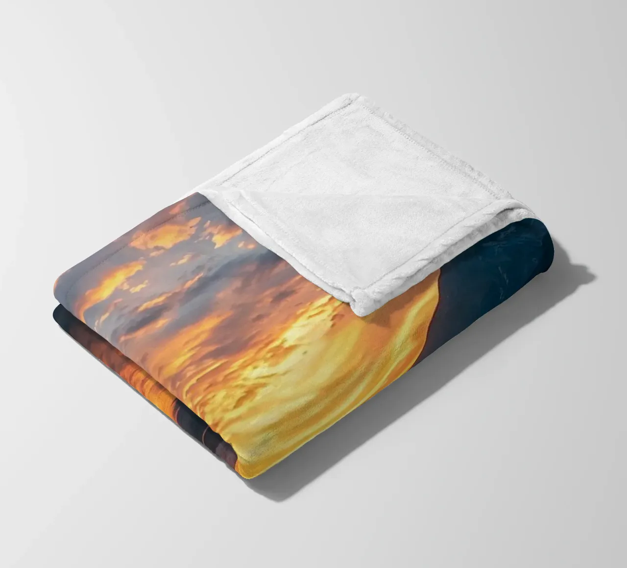 Sunset reflects on calm lake with mountains fleece blanket by DesignDoodle