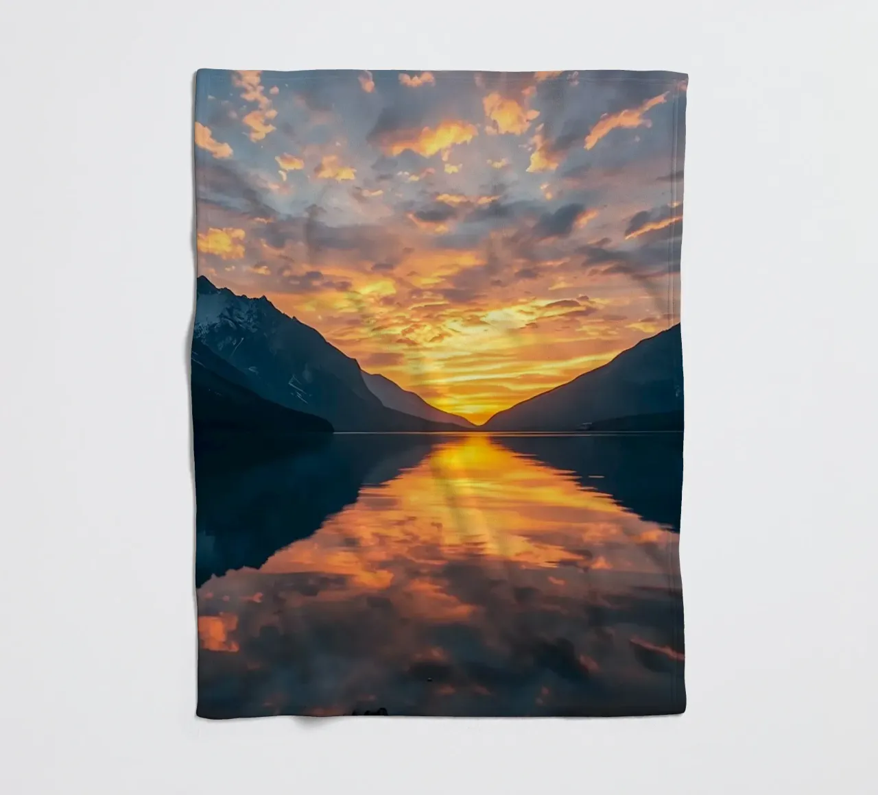 Sunset reflects on calm lake with mountains fleece blanket by DesignDoodle