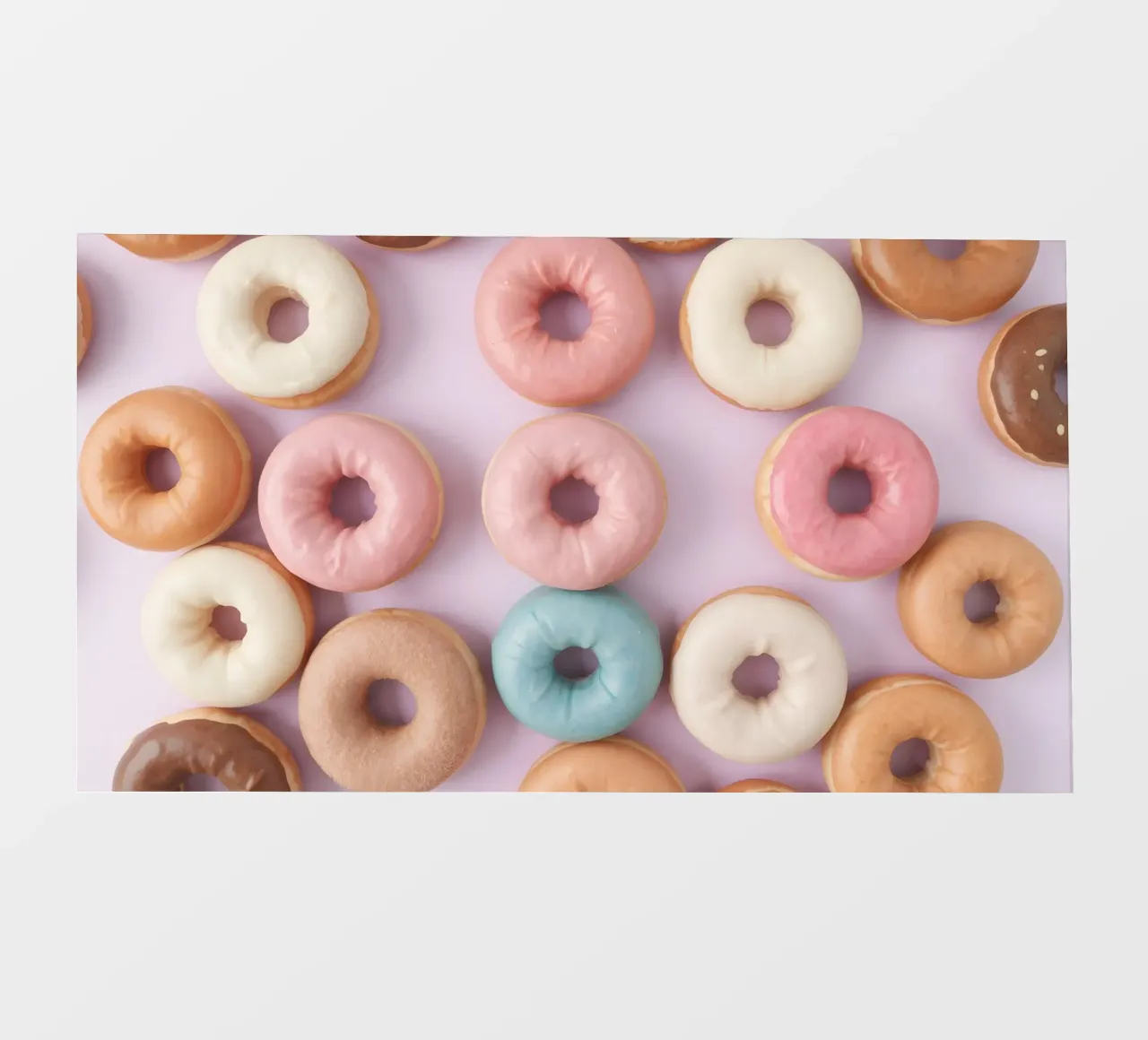 ciambelle disposte su uno sfondo pastello perfetto per il dessert l telo in pvc da DesignDoodle