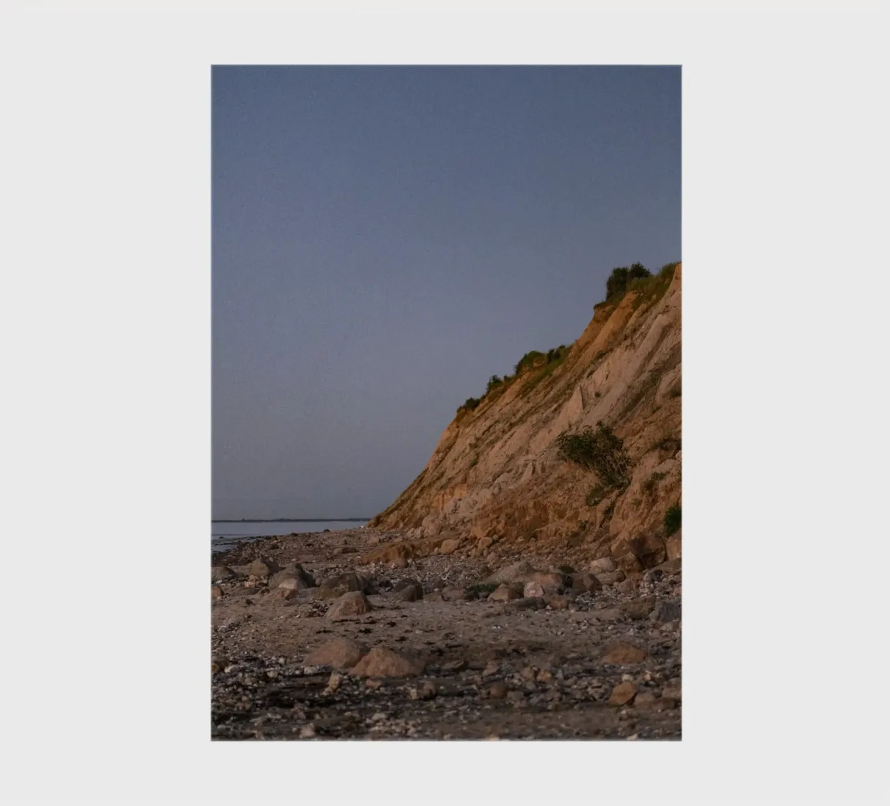 Felsen am Strand in der Dämmerung notebook by Stina Freytag