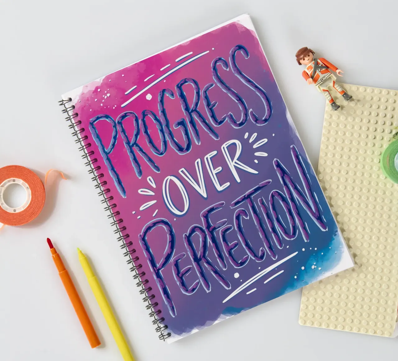 PROGRESS OVER PERFECTION spiral notebook by logic
