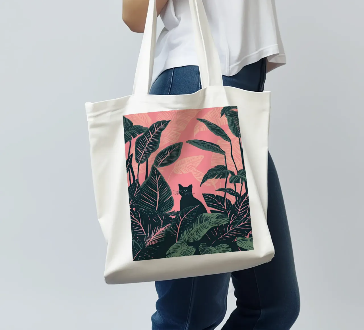 Gatto nero nella giungla di Calathea rosa e verde borsa in juta da Autofocus
