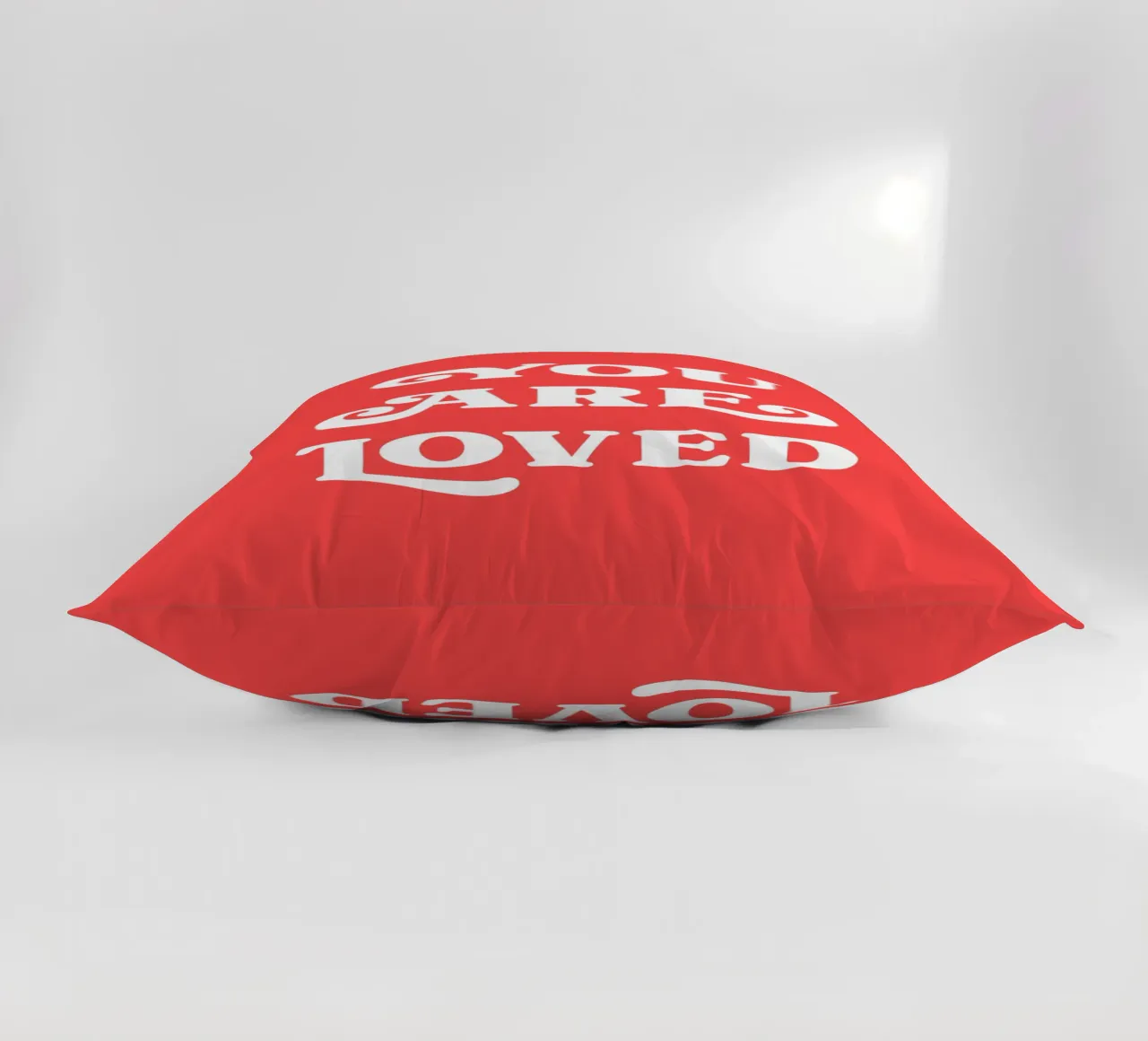 You are loved (Sweet Red Tone) decorative cushion by Paigaam Studio