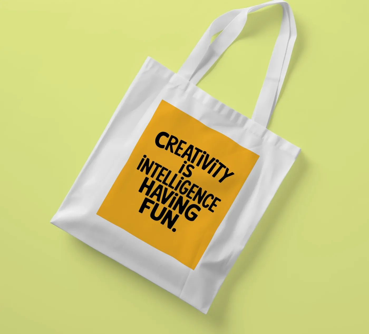 Creativity is intelligence having fun. tote bag by logic